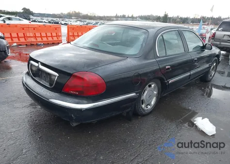 1998 Lincoln Continental z USA, uszkodzony, nr VIN 1LNFM97V9WY676425